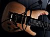 Mahogany body with flame maple top; Maple Wizard II neck; rosewood fingerboard with oval inlays; 24 jumbo frets; 25.5" scale; Ibanez V8 (B), S1 (M) and V7 (N) pickups; volume, tone with push/pull, 5-way pickup selector; gold hardware; Platinum Blonde finish