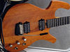 Solid mahogany body; bolt-on maple neck; ebony fingerboard; 22 frets; 25.5" scale; 2 x Parker humbuckers (splittable), Fishman piezo; mag volume/tone, piezo volume, 2 x pickup selectors; nickel silver hardware; natural, red or black finish