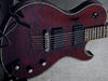 Solid mahogany body; set mahogany neck; rosewood fingerboard; 24 frets; 25.5" scale; EMG 81-TW (bridge) and 89 (neck); 2x volume, tone, 3-way pickup selector; black chrome hardware; black cherry, black or white finish