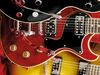 Mahogany body; mahogany, set-in neck; rosewood fingerboard; 22 medium frets; 24.75" scale; 2 x Duncan Designed humbuckers; 2 x volume, tone and coil split controls; chrome hardware; See-thru Cherry, Gloss Black or 2-tone Sunburst finish