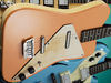 Masonite/pine frame body; bolt-on maple neck; rosewood fingerboard; 24.75" scale; 2 x lipstick singlecoils; volume, tone and 3-way pickup selector; adjustable fixed bridge, enclosed machineheads; same finish options as the '63 plus royal blue and tan