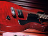 Mahogany body; mahogany set-in neck; rosewood fingerboard; 24.75" scale; Wilkinson P90-style stacked ceramic pickups; volume and tone controls; combined bridge/tailpiece; cherry red finish