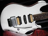 Solid basswood body, flat top; bolt-on maple neck; ultra-fast profile; rosewood fingerboard, dot inlays; 25.5" scale; custom-wound, HP Special (2 x humbuckers, single-coil) pickups; volume, tone, 5-way pickup selector; chrome hardware; white or sunburst finish