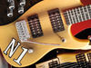 Solid wood body; bolt-on maple neck; rosewood fingerboard; 22 frets; 25.5" scale; 2 x Washburn humbuckers (with coil tap); volume, 3-way pickup selector; chrome/diecast hardware; aged finish