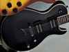 Mahogany body; maple neck; rosewood fingerboard; 24 frets; 25.5" scale; 2 x DMT Design humbuckers; volume, tone, 3-way pickup selector; black nickel hardware; Classic Black or Metallic Charcoal finish