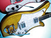 Basswood body; maple neck; rosewood fingerboard; 22 frets; 25.5" scale; 2 x Eko Humbuckers; volume, tone, 3-way pickup selector; chrome hardware; gold sparkle, blue sparkle or red sparkle finish