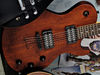 Basswood body; maple neck; rosewood fingerboard; 22 frets; 24.75" scale; 2 x Schecter Diamond Plus humbuckers; 2 x volume, tone, 3-way pickup selector; black chrome hardware; Walnut Satin or Black finish