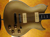 Solid mahogany body with carved top; set mahogany neck; rosewood fingerboard with pearl wing inlays; 24.75" scale; 2 x stacked P-90s; 2 x volume, 2 x tone (with coil-split), 3-way pickup selector; chrome hardware; gold finish