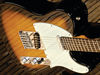 Solid alder body; bolt-on rock maple neck; rosewood fingerboard with dot inlays; 25.5" scale; 2 x singlecoils; volume, tone, 3-way selector, VSC;  chrome hardware; two-tone sunburst, black, white, red or blue/green finish