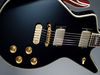 Mahogany body; set mahogany neck; rosewood fingerboard; 24.75" scale; 2 x Dean Humbuckers; 2 x volume, 2 x tone, 3-way pickup selector; gold hardware; black finish
