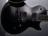 Solid mahogany body with quilted maple top; set mahogany neck; ebony fingerboard with 'blade' inlays; 24.75" scale; EMG 85 (neck), EMG 81 (bridge) pickups; volume, tone, 3-way pickup selector; black hardware; midnight ebony finish