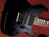 Solid basswood body; bolt-on rock maple neck; rosewood fingerboard with shark fin inlays; 25.5" scale; 2 x EMG-HZ humbuckers; master volume, master tone; black die-cast hardware; black or gun metal grey finish