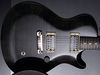 Solid mahogany body with maple top; set mahogany neck; rosewood fingerboard with moon inlays; 25" scale; 2 x PRS humbuckers; volume, tone, 3-way pickup selector; chrome hardware; grey black, blue matteo, tobacco sunburst or black finish