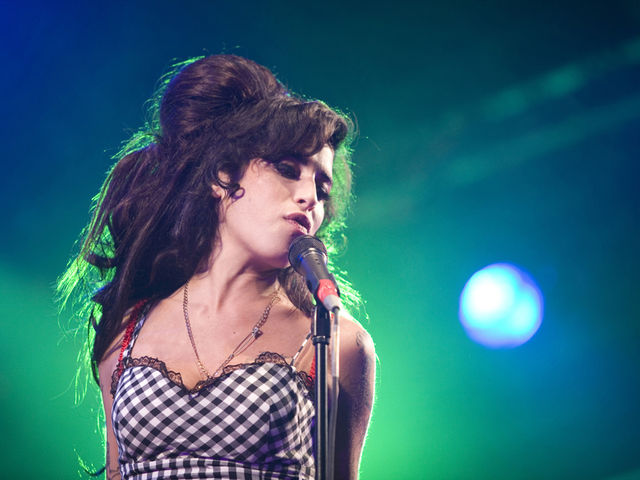 Winehouse says her new album will be out in six months. Her producer isn't so sure