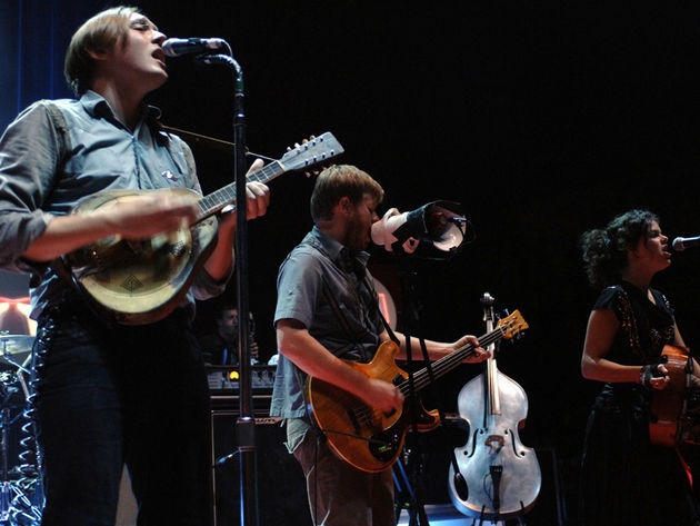Win Butler, Tim Kingsbury, and Regine Chassagne of Arcade Fire are going to 'The Suburbs.' Or something like that