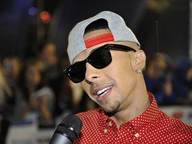 Brian May guests in Dappy's Rockstar video