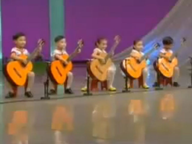These kids should be doing their homework. On second thought, let 'em play guitar!