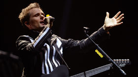 Muse's Matt Bellamy breaks foot, band cancels shows