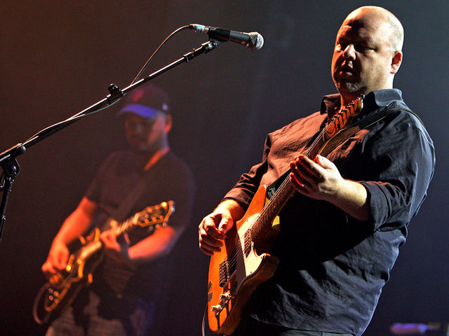 Black Francis and Joey Santiago (left) and the other Pixies played their longest set ever last night