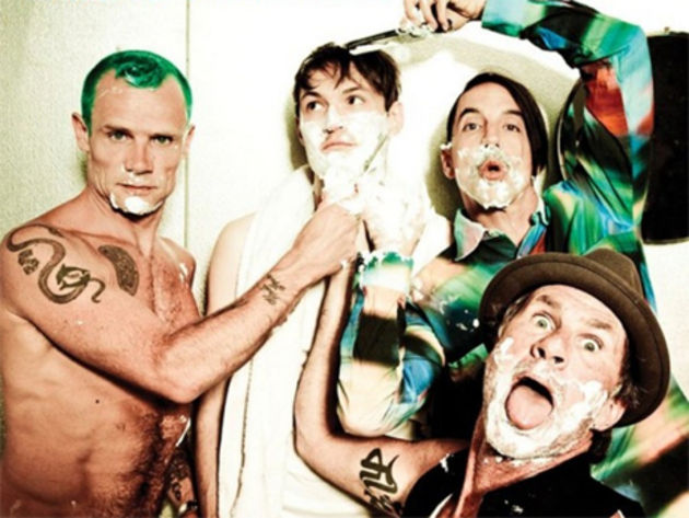 Flea (left) discusses what Josh Klinghoffer (center) brings to the Chili Peppers