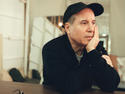 Robber impersonates Paul Simon in bank scam - epic fail