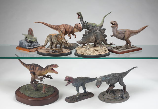 Lot 397: One of five groups of replica dinosaur models
