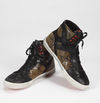 Lot 487: Slash-worn Superbowl XLV hightop sneakers Starting bid: $300 Estimate: $6-800