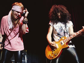 Slash thinks Axl Rose's greatest lead singer accolade is "pretty f*cking cool"