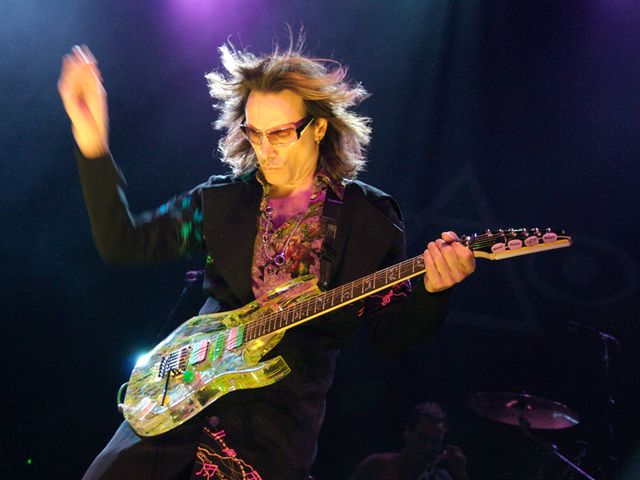 Vai shows off his 20th Anniversary Ibanez Jem