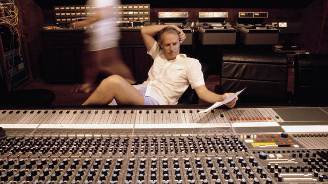 George Martin behind the console in the '80s