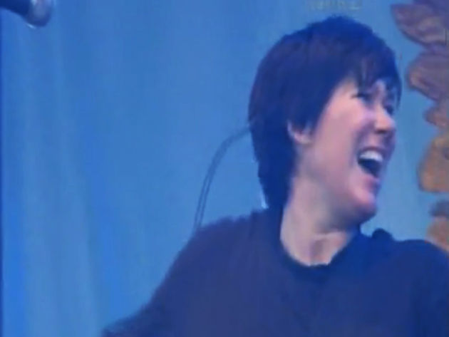Kim Deal is one happy girl during Pixies' Isle Of Wight set