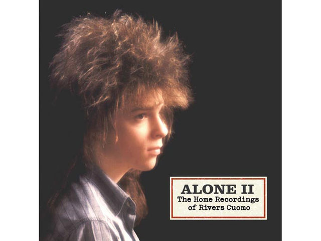 Rivers rocking a truly outstanding barnet during his high school hair metal period