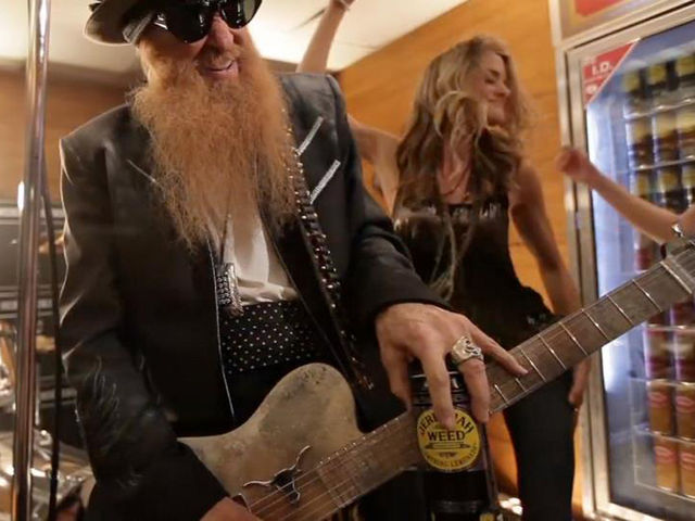 Billy Gibbons slides around with a friend