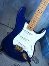 Cobalt Blue Transparent finish on an alder body with AA flame maple top