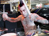 The Blink-182 drummer shows off his tats in Detroit, 2006