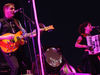 Performing on the Neon Bible tour, complete with Neon lighting. You see what they did there?