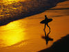 Sun down, surf's up on Huntington Beach