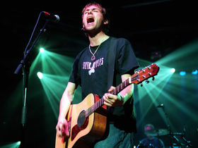 20 acoustic guitar-playing front men