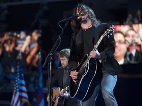 20 acoustic guitar-playing front men