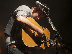 20 acoustic guitar-playing front men