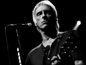 20 acoustic guitar-playing front men