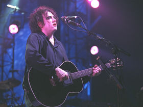 20 acoustic guitar-playing front men