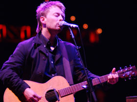 20 acoustic guitar-playing front men
