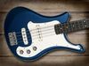 Our picture shows the more modern SB-7A that has no bridge cover plate and the two pickups are set straight and closer together. Even if you can't find an old one this is still a great bass to own!