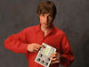 Beck fiddles with his Electro-Harmonix DRM-32 drum machine in 1997.