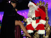 Eartha Kitt shows Santa some leg in 2006. In an effort to secure everything on that Christmas list, presumably