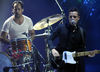 Ronnie Vannucci and Flowers perform with The Killers in Sacramento, California on September 22, 2009