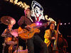 Setzer brings a swing guitar feel to the track.