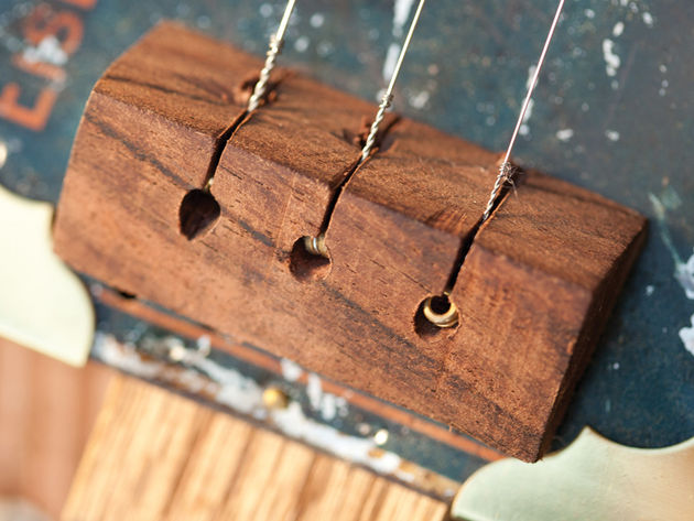Tin cigar box guitar