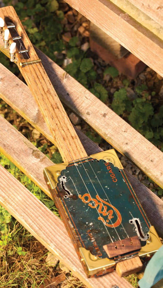 Tin cigar box guitar